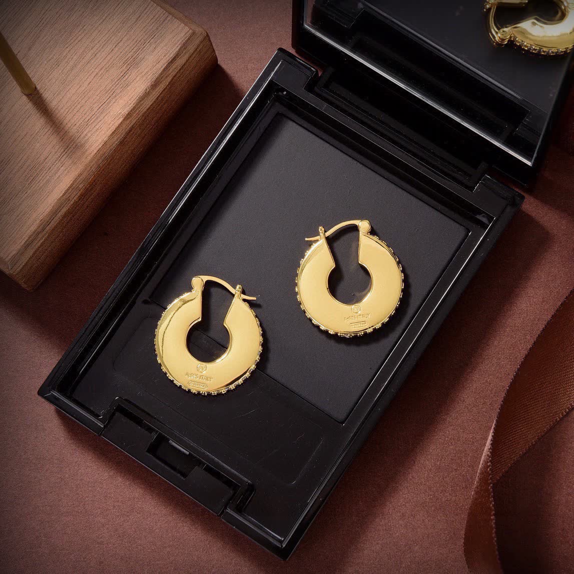 Bottega Veneta Elegant Gold Hoop Earrings with Diamond Accents